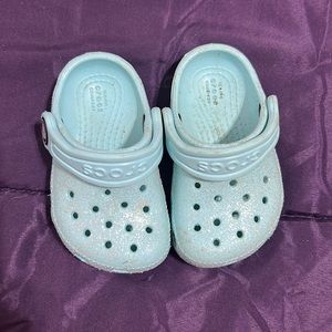 Blue glitter baby crocs girl size 4